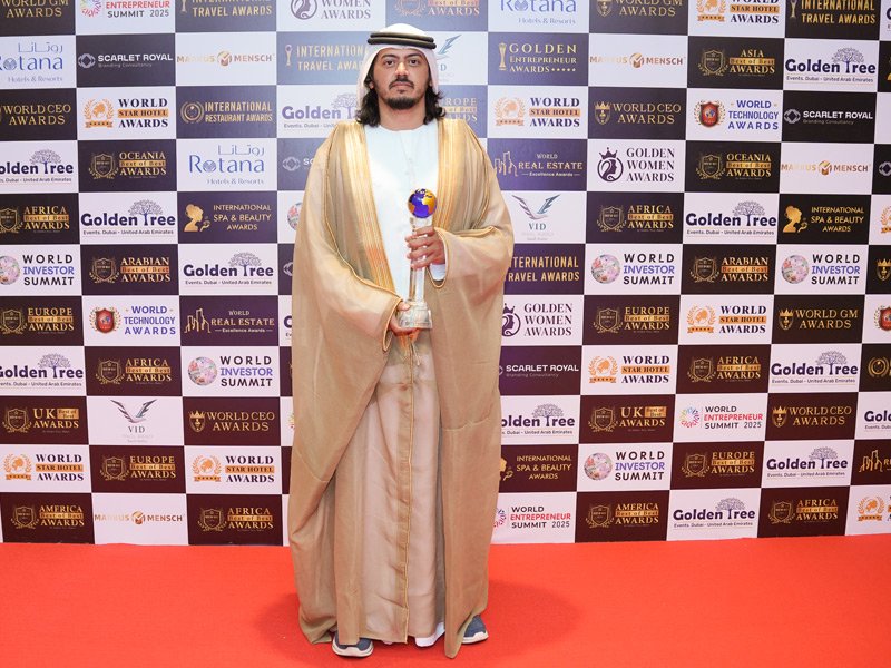 Entrepreneur accepting recognition at the Golden Entrepreneur Awards